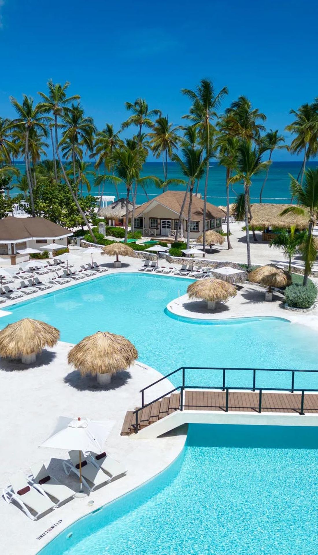 Kids enjoying the splash pad and outdoor activities at Sunscape Coco Punta Cana